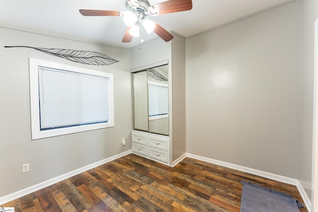 1230 Melton Rd Unit # 16, West Union, SC 29696 - unfurnished bedroom featuring dark wood-type flooring, baseboards, a closet, and a ceiling fan