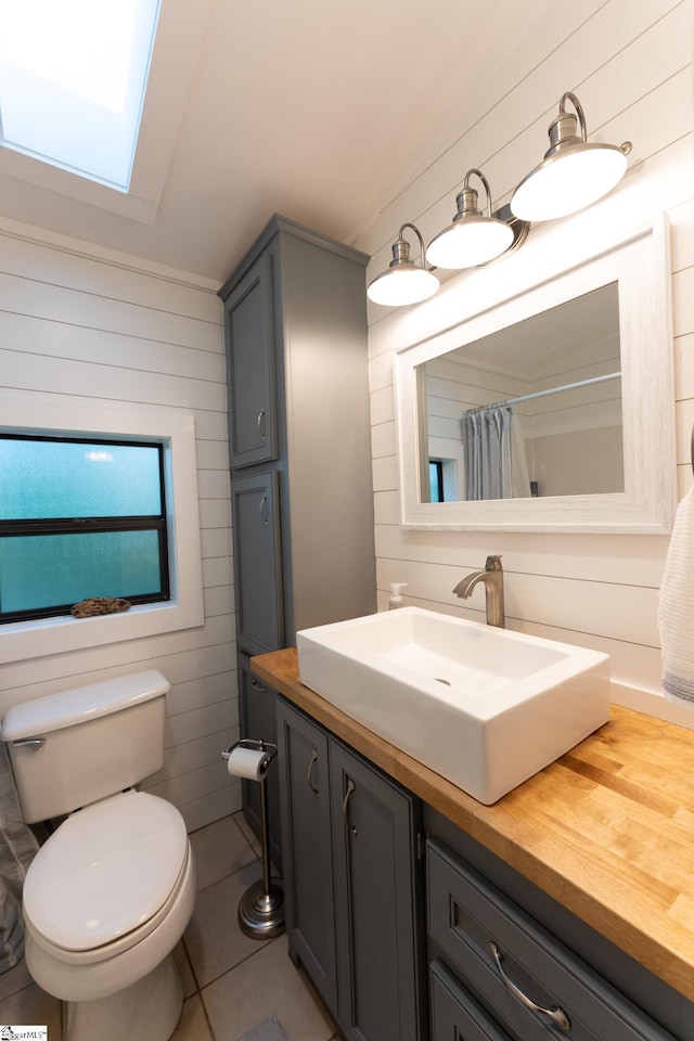 1230 Melton Rd Unit # 16, West Union, SC 29696 - full bathroom featuring a skylight, vanity, toilet, a shower with curtain, and tile patterned floors
