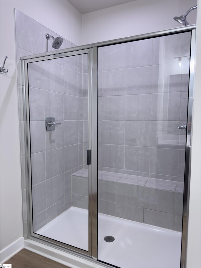 bathroom featuring a shower stall
