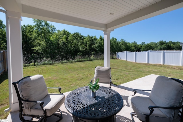 view of patio with view of scattered trees