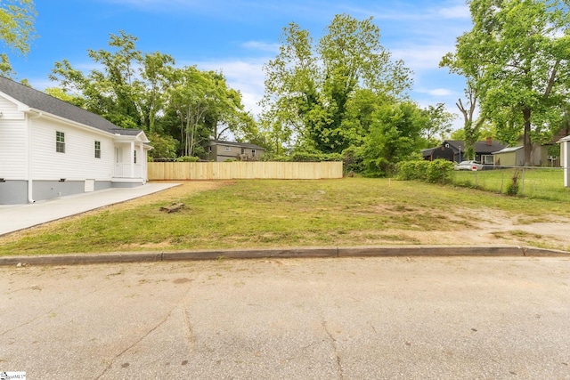 view of yard with fence