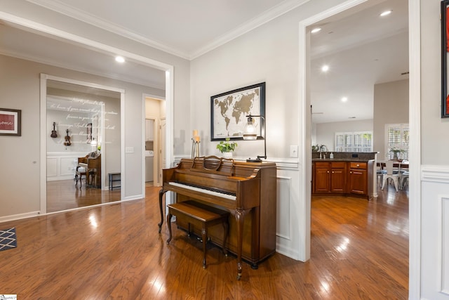208 Medoc Ln, Moore, SC 29369 - corridor with dark wood-type flooring, ornamental molding, recessed lighting, a decorative wall, and a wainscoted wall