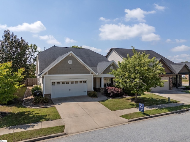 208 Medoc Ln, Moore, SC 29369 - craftsman house featuring concrete driveway, stone siding, and an attached garage