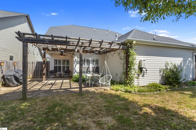 208 Medoc Ln, Moore, SC 29369 - back of house featuring a ceiling fan, a pergola, a patio area, and roof with shingles