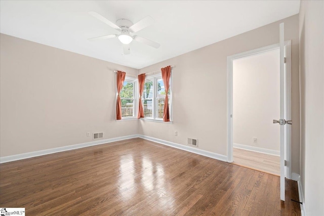 222 Woodview Ave, Spartanburg, SC 29306 - unfurnished room featuring wood finished floors, a ceiling fan, and baseboards