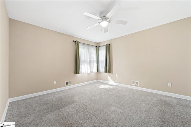 222 Woodview Ave, Spartanburg, SC 29306 - spare room with carpet floors, a ceiling fan, and baseboards