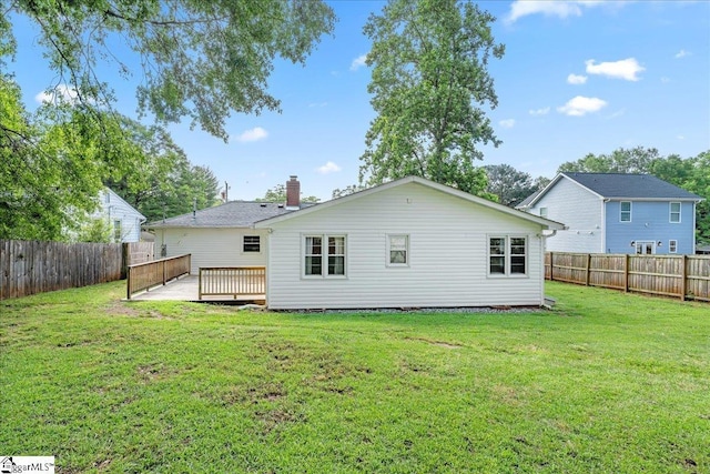 222 Woodview Ave, Spartanburg, SC 29306 - rear view of property featuring a wooden deck and a chimney