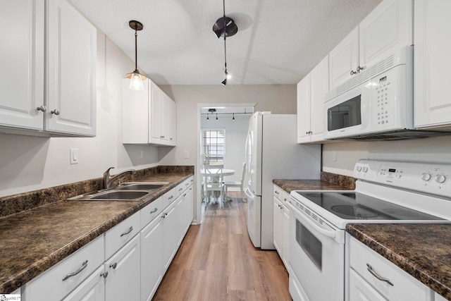 330 Split Oak Ln, Inman, SC 29349 - kitchen with white appliances, a sink, white cabinetry, dark countertops, and a textured ceiling