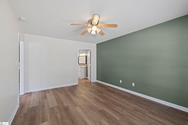 330 Split Oak Ln, Inman, SC 29349 - empty room featuring a ceiling fan, wood finished floors, a smoke detector, and baseboards