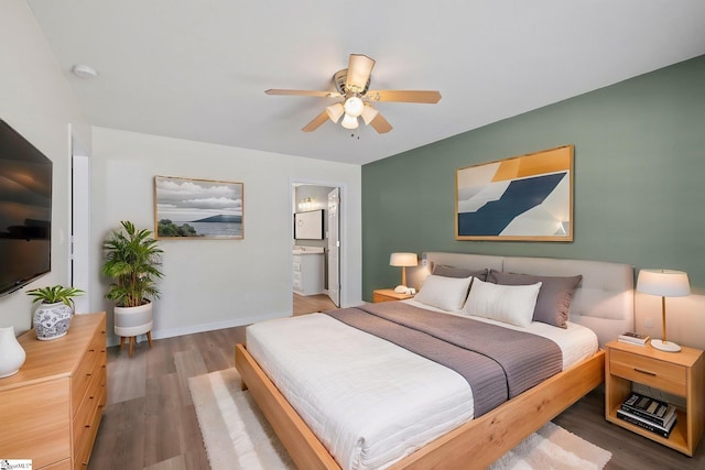 330 Split Oak Ln, Inman, SC 29349 - bedroom featuring wood finished floors, connected bathroom, ceiling fan, and baseboards
