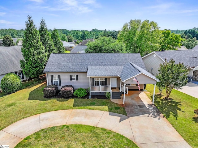 330 Split Oak Ln, Inman, SC 29349 - view of front of home with driveway, a front lawn, a porch, a shingled roof, and a carport