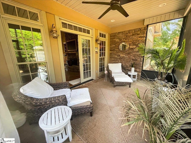 view of patio featuring a ceiling fan