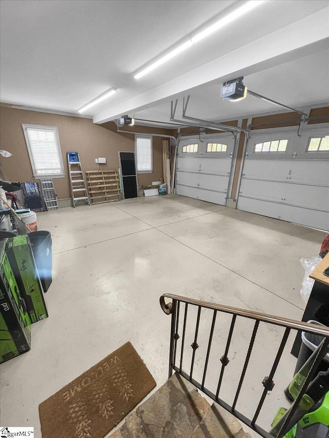 garage featuring a garage door opener