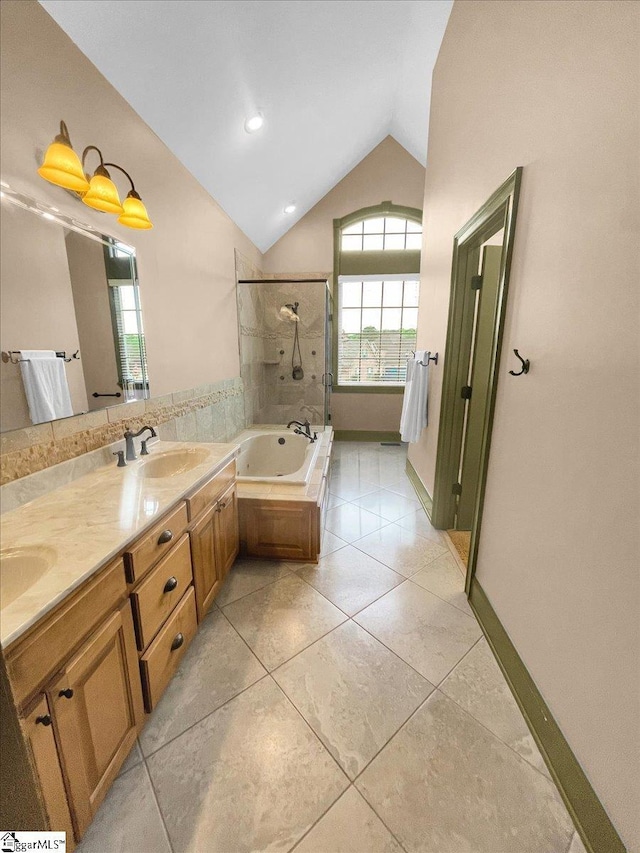 bathroom featuring vaulted ceiling, an enclosed shower, a bath, tile patterned floors, and double vanity