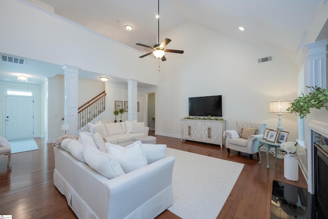 living area featuring stairs, dark wood-style floors, a ceiling fan, high vaulted ceiling, and recessed lighting