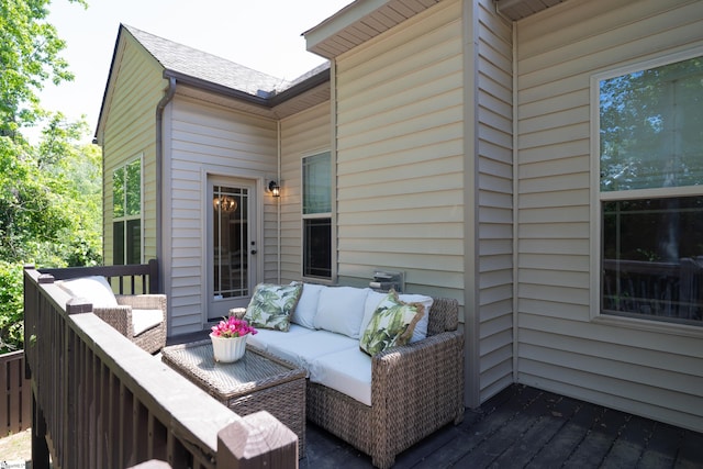 wooden deck featuring outdoor lounge area