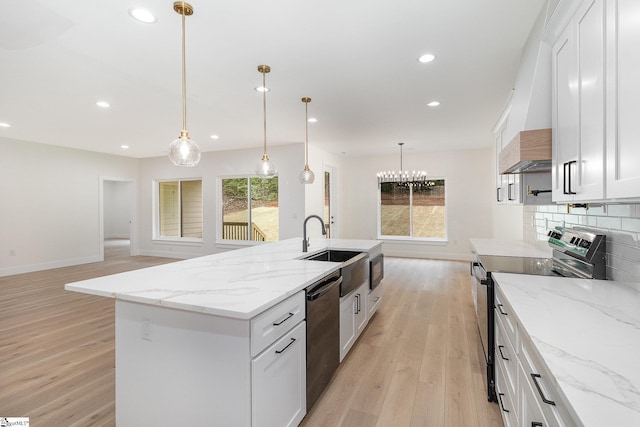 kitchen featuring electric stove, dishwashing machine, wall chimney range hood, light wood-style flooring, and recessed lighting