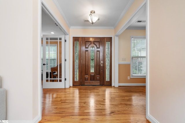 426 Isaqueena Dr, Greer, SC 29651 - foyer entrance featuring light wood-type flooring, ornamental molding, and baseboards