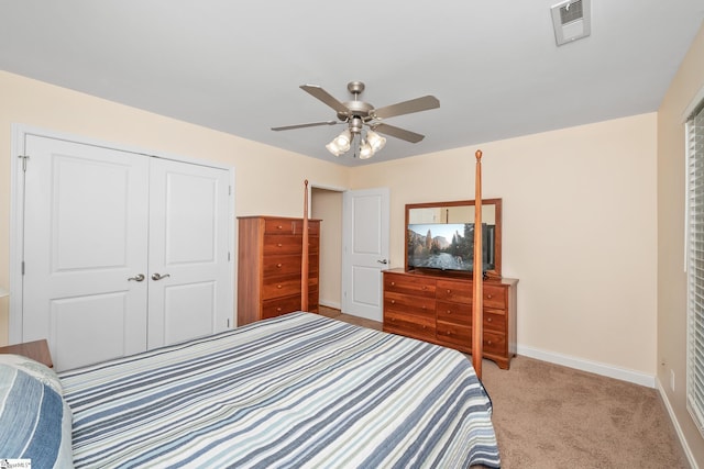 426 Isaqueena Dr, Greer, SC 29651 - bedroom featuring light carpet, baseboards, a closet, and a ceiling fan