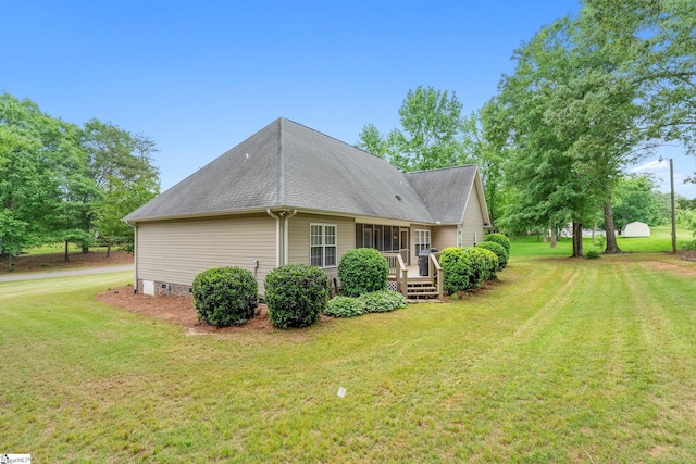 426 Isaqueena Dr, Greer, SC 29651 - view of home's exterior featuring a yard, a deck, and a shingled roof