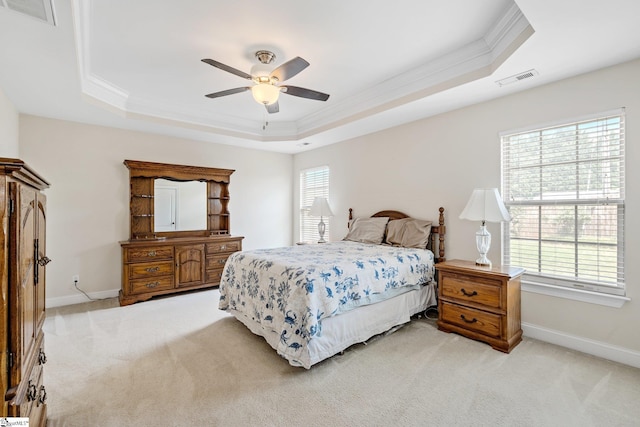 11 Penrith Ct, Simpsonville, SC 29681 - bedroom featuring a tray ceiling, ornamental molding, light colored carpet, and baseboards