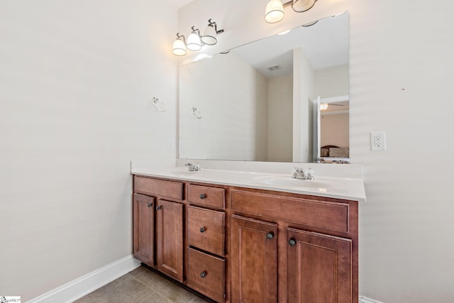 11 Penrith Ct, Simpsonville, SC 29681 - bathroom with baseboards, double vanity, ensuite bath, and tile patterned floors