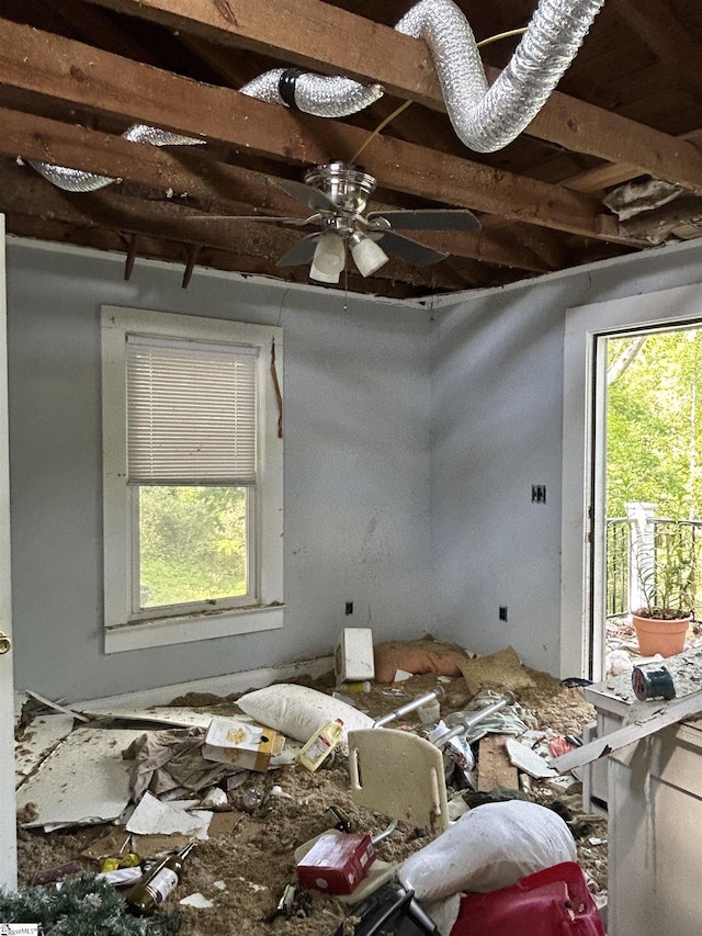 unfurnished room with plenty of natural light and ceiling fan