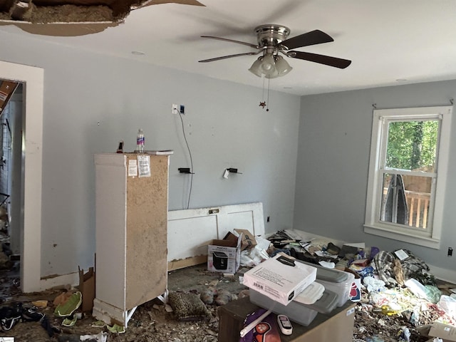misc room with a ceiling fan