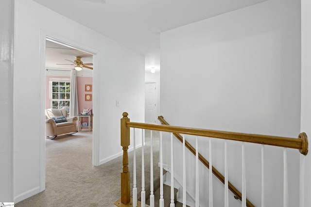 135 Bathurst Ln, Simpsonville, SC 29681 - hall with an upstairs landing, carpet, and baseboards
