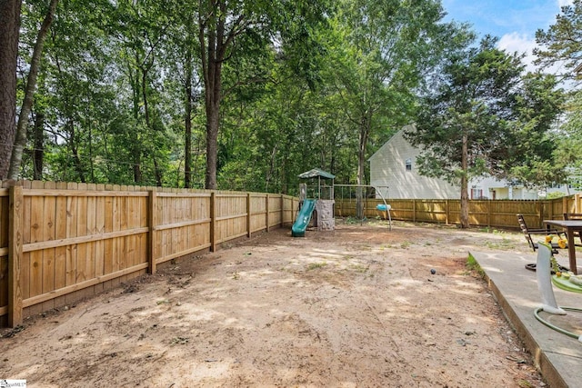 135 Bathurst Ln, Simpsonville, SC 29681 - fenced backyard featuring a playground
