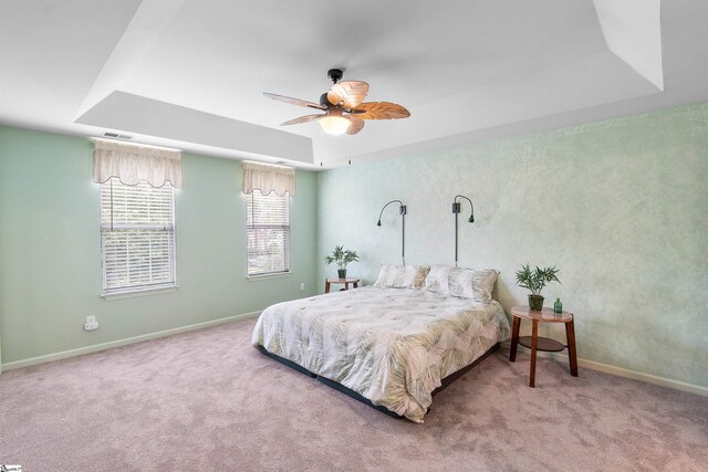 26 Willow Oak Ct, Simpsonville, SC 29681 - carpeted bedroom with a raised ceiling, baseboards, and ceiling fan