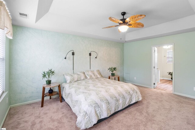 26 Willow Oak Ct, Simpsonville, SC 29681 - bedroom with carpet, baseboards, a ceiling fan, ensuite bath, and a raised ceiling