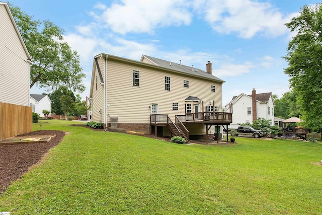 26 Willow Oak Ct, Simpsonville, SC 29681 - back of property with stairway, a wooden deck, a yard, and a chimney