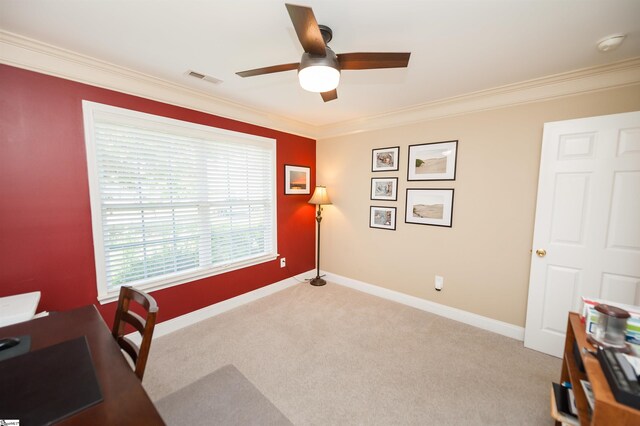 office with a ceiling fan, crown molding, light colored carpet, and baseboards