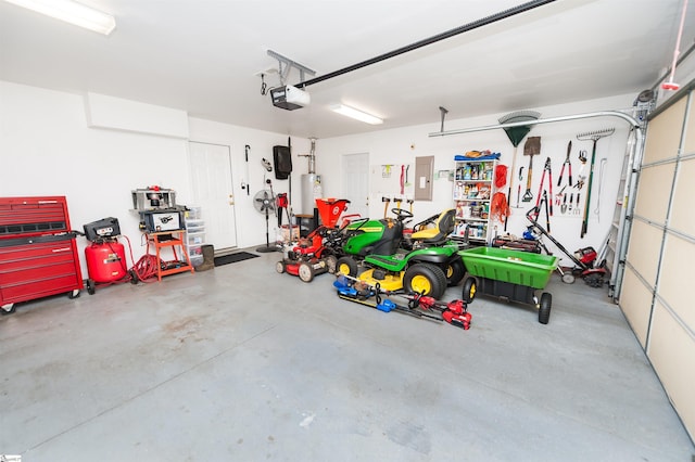 garage with electric panel and a garage door opener