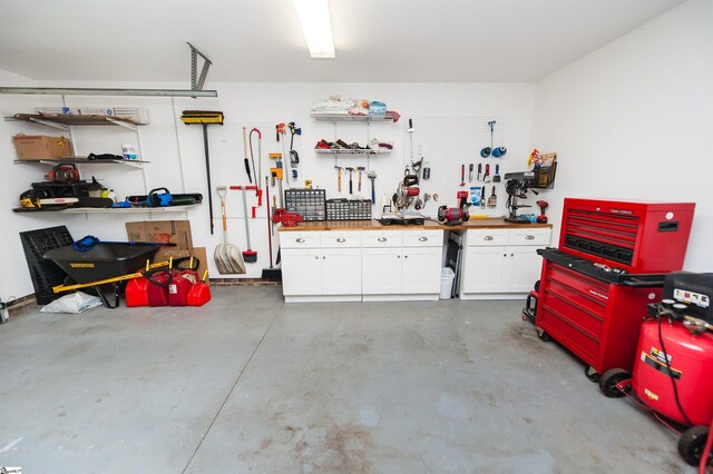 garage featuring a workshop area
