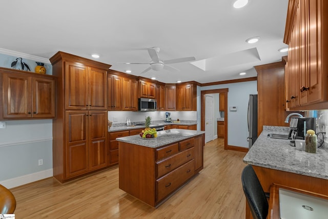 155 Mountain Lake Dr, Piedmont, SC 29673 - kitchen with a sink, appliances with stainless steel finishes, baseboards, a kitchen island, and ornamental molding