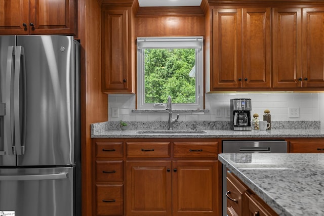 155 Mountain Lake Dr, Piedmont, SC 29673 - kitchen with stainless steel fridge with ice dispenser, a sink, tasteful backsplash, and brown cabinets