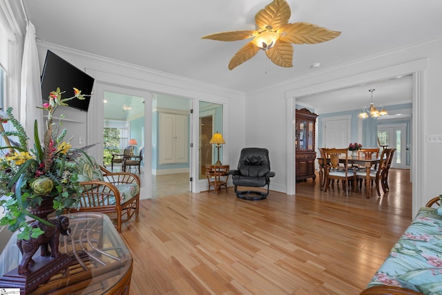 155 Mountain Lake Dr, Piedmont, SC 29673 - living room featuring a chandelier, light wood-style floors, healthy amount of natural light, crown molding, and a ceiling fan