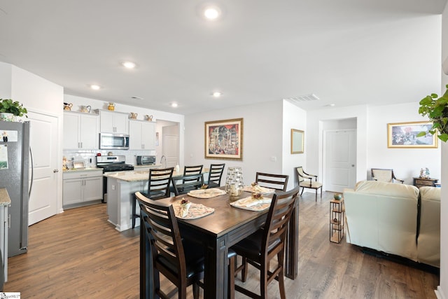 51 Oak Edge Ln, Greer, SC 29651 - dining space featuring dark wood-style flooring and recessed lighting