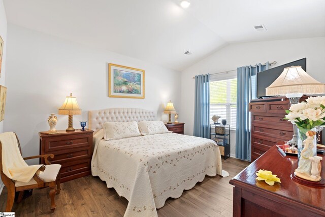 51 Oak Edge Ln, Greer, SC 29651 - bedroom featuring vaulted ceiling and wood finished floors