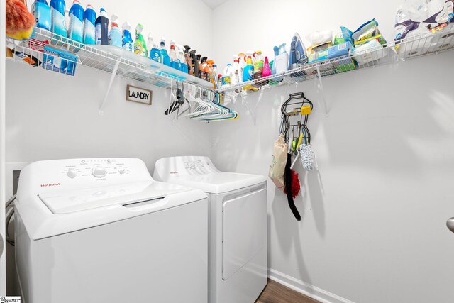 51 Oak Edge Ln, Greer, SC 29651 - clothes washing area with washer and clothes dryer, wood finished floors, and baseboards