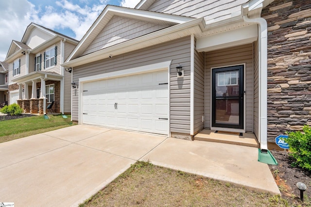 51 Oak Edge Ln, Greer, SC 29651 - view of side of property featuring driveway, a garage, and stone siding