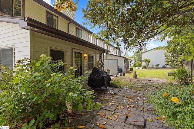 view of patio with a grill