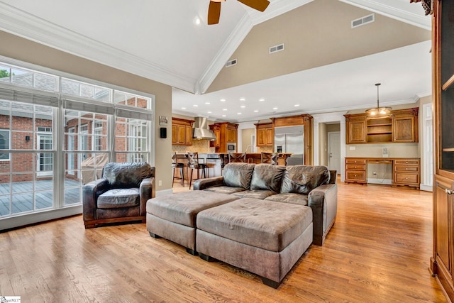 living area with light wood-style floors, a ceiling fan, high vaulted ceiling, ornamental molding, and recessed lighting