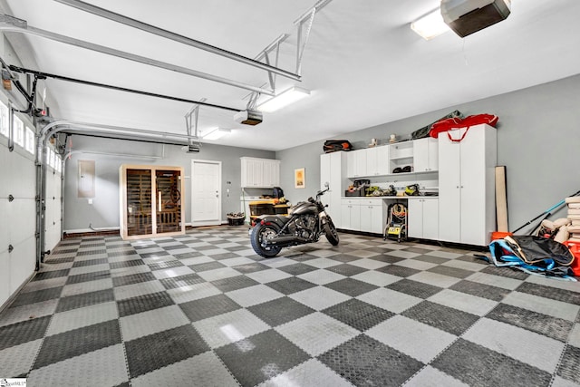 garage featuring a garage door opener