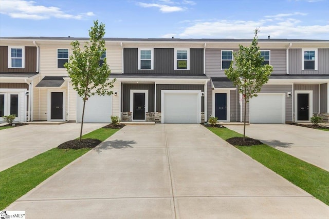 102 Randwick Ln, Greer, SC 29651 - townhome / multi-family property featuring board and batten siding and driveway