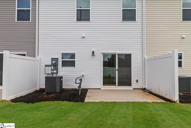 102 Randwick Ln, Greer, SC 29651 - rear view of house featuring central AC unit and a patio area