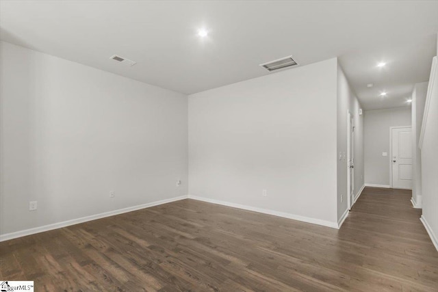 102 Randwick Ln, Greer, SC 29651 - empty room featuring wood finished floors, baseboards, and recessed lighting