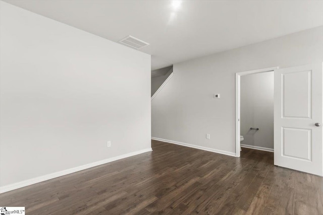 102 Randwick Ln, Greer, SC 29651 - empty room with dark wood-style flooring and baseboards